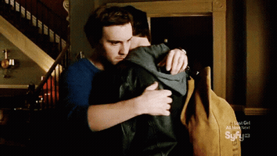 Two Men Hugging Lost Girl All New Next Sign GIF