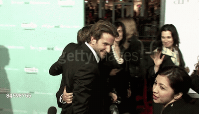 Two Men Hugging On Red Carpet 84598755 GIF