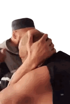 Two Men Hugging One Wearing Hat Sticker