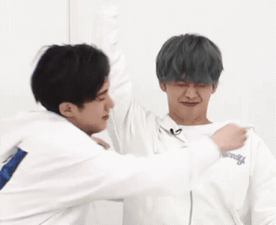 Two Men Hugging One Wearing New York Sweatshirt GIF
