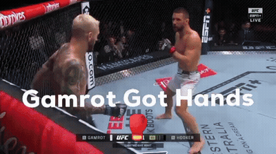 Two Men In A Boxing Ring With The Words Gamrot Got Hands On The Bottom GIF
