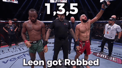 Two Men In A Boxing Ring With The Words Leon Got Robbed Below Them GIF
