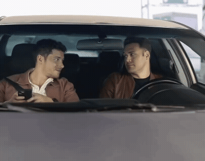 Two Men In A Car Talking To Each Other GIF