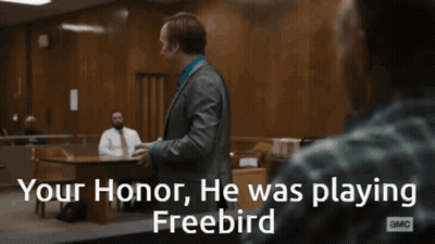 Two Men In A Courtroom With The Words " Your Honor He Was Playing Freebird " On The Bottom GIF