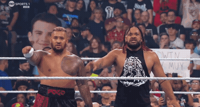 Two Men In A Wrestling Ring With A Sign That Says Tnt Sports 1 Live GIF