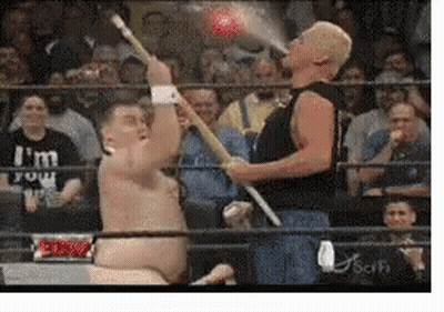 Two Men In A Wrestling Ring With One Wearing A Shirt That Says " I 'M Four " GIF