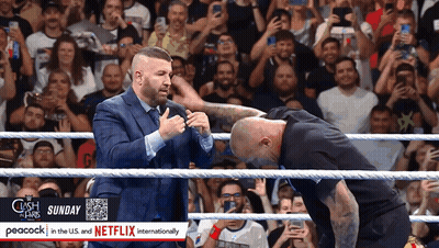 Two Men In A Wrestling Ring With Peacock In The U.s. And Netflix Internationally On The Bottom GIF
