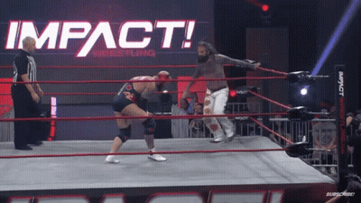 Two Men In A Wrestling Ring With The Words Impact Wrestling On The Wall GIF