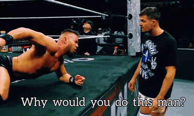 Two Men In A Wrestling Ring With The Words " Why Would You Do This Man " Above Them GIF