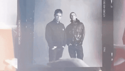 Two Men In Black And White Photo 1945 GIF