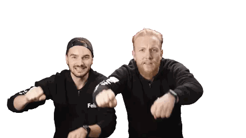 Two Men In Black Felix Sweatshirts Pointing At Camera Sticker