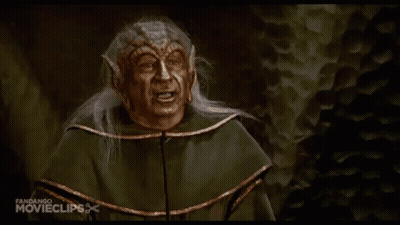Two Men In Black Helmets Standing GIF