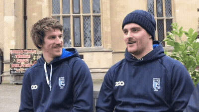 Two Men In Blue Zoo Sweatshirts GIF