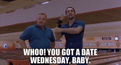 Two Men In Bowling Alley One Pointing At Other GIF