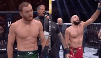 Two Men In Boxing Ring Celebrating GIF