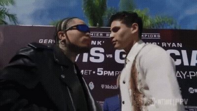 Two Men In Boxing Ring One Wearing Crown GIF