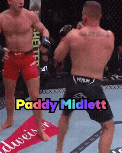 Two Men In Boxing Ring With Paddy Midlett GIF