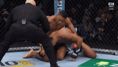Two Men In Boxing Ring With Toyot Banner GIF