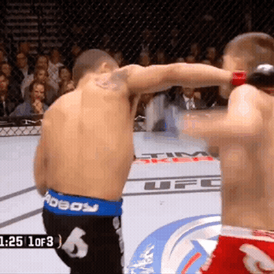 Two Men In Boxing Ring With UFC Logo GIF