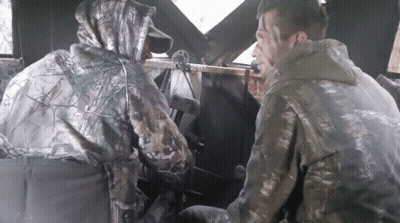 Two Men In Camo Jackets Sitting In Car GIF