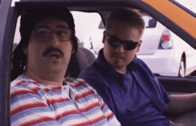 Two Men In Car One With Sunglasses GIF