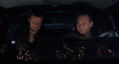 Two Men In Car Yellow Crow Bars Up GIF