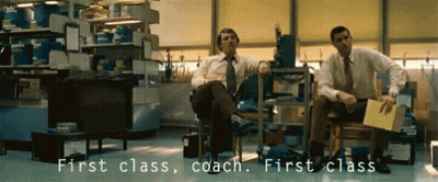 Two Men In Chairs Saying First Class Coach GIF