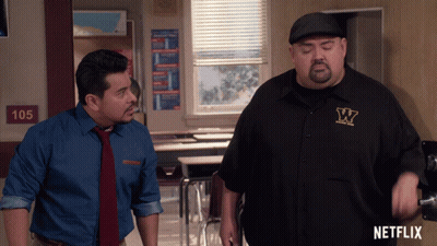 Two Men In Classroom With 105 Sign GIF