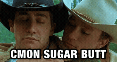 Two Men In Cowboy Hats Are Hugging Each Other With The Words Cmon Sugar Butt Written Below Them GIF