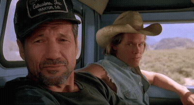 Two Men In Cowboy Hats Sitting In Truck GIF