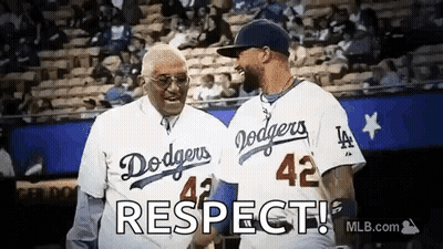 Two Men In Dodgers Jerseys Shaking Hands GIF