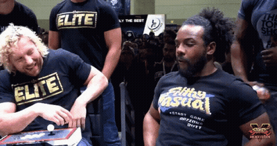 Two Men In Elite And Silly Casual Shirts GIF