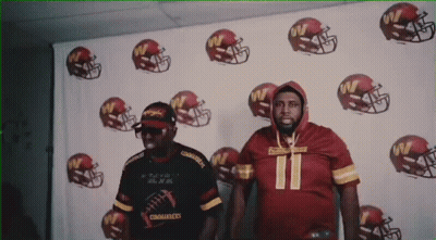 Two Men In Football Helmets Number 11 GIF