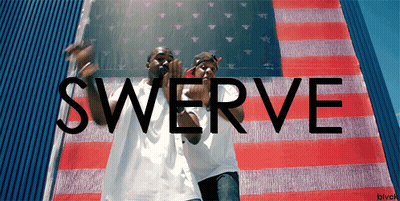 Two Men In Front Of American Flag Saying Swerve GIF