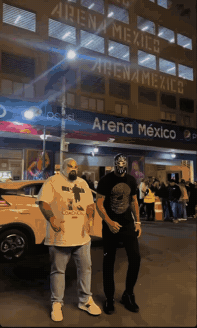 Two Men In Front Of Arena Mexico GIF