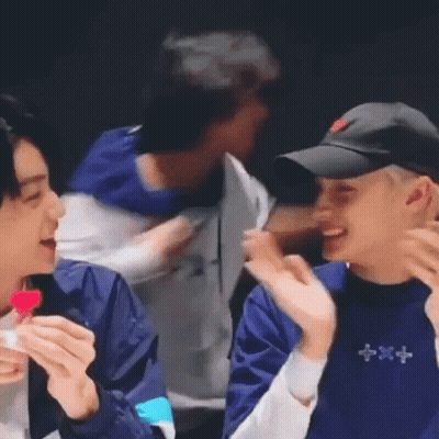 Two Men In Front Of Mirror One Wearing Tomorrow Shirt GIF