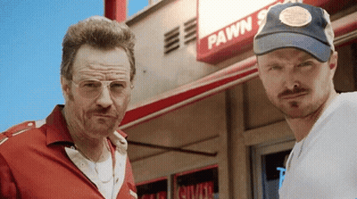 Two Men In Front Of Pawn Store GIF