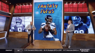 Two Men In Front Of Screen Saying Fantasy Focus GIF