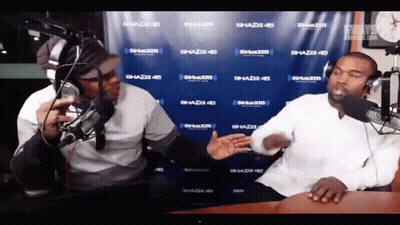 Two Men In Front Of SiriusXM Banner GIF