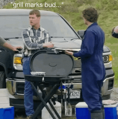 Two Men In Front Of Truck Saying Grill Marks Bud GIF