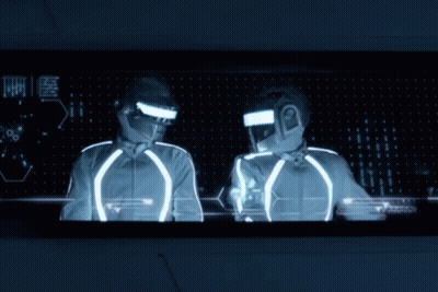 Two Men In Futuristic Helmets In Front Of Chinese Characters Screen GIF