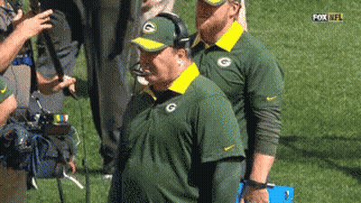 Two Men In Green Bay Packers Shirts GIF