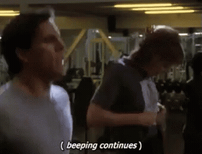 Two Men In Gym One Saying Beeping Continues GIF