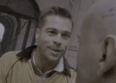 Two Men In Hallway, One Wearing Nike Jacket GIF