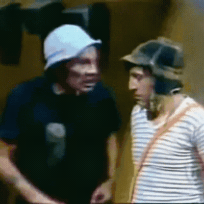 Two Men In Hats And Striped Shirts Talking GIF