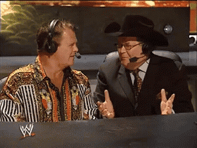 Two Men In Headphones And Cowboy Hat At Table With W Logo GIF