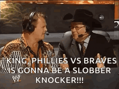 Two Men In Headphones And Hat Talking On TV GIF