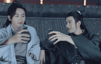 Two Men In Kimonos Holding Vase And Cup GIF