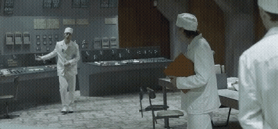 Two Men In Lab Coats Talking GIF