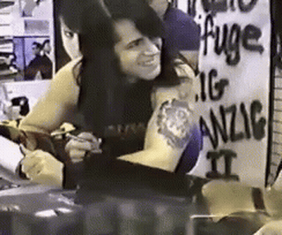 Two Men In Leather Jackets Talking GIF
